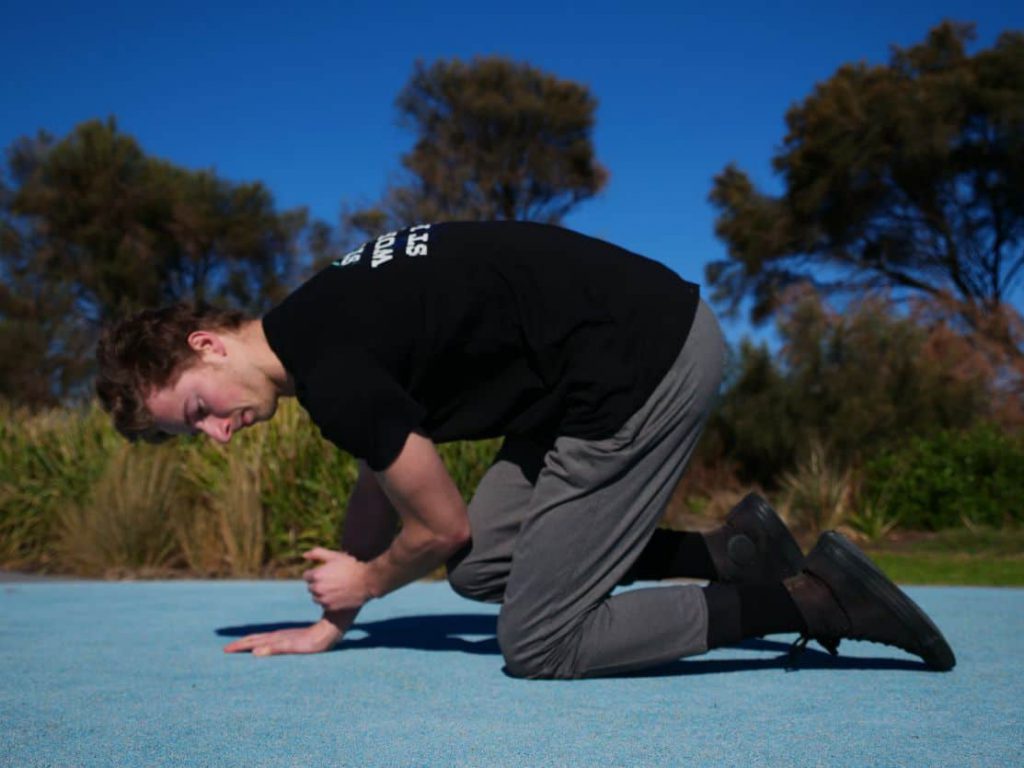 Man exercing on the ground outdoor