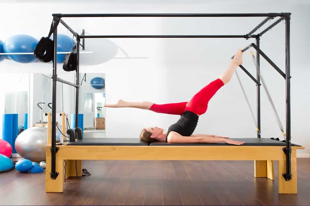 Woman doing pilates exercise