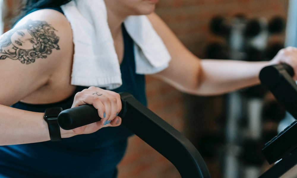 woman on exercise bike