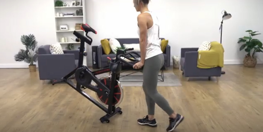 woman keeping her spin bike